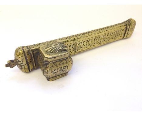 A brass scribes travelling inkwell and quill holder with engraved Persian decoration.
