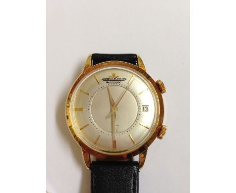 A Jaeger-Le Coultre 18 carat gold cased Memovox wristwatch on leather strap, bumper movement, inner rotating dial with arrow 