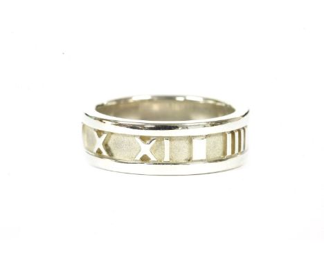 A sterling silver Tiffany Atlas ring, with raised Arabic numerals, signed Tiffany, c.1995, size K