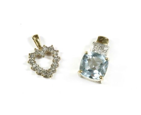 A 9ct gold diamond open heart shaped pendant, and a 9ct gold single stone step cut topaz pendant on a diamond set baleheart 1