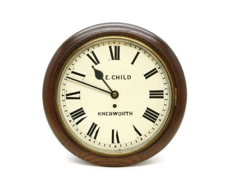 An oak dial clock, the white painted dial inscribed 'E. Child, Knebworth', fitted single fusee movement, complete with key an