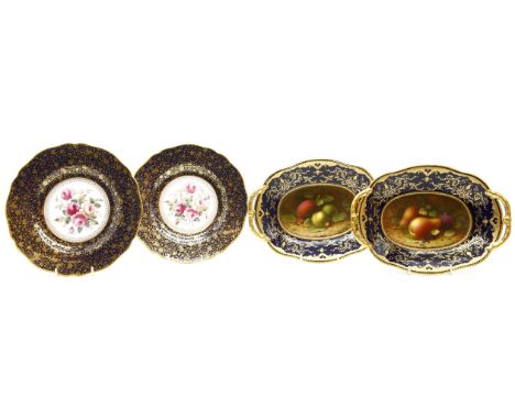 A pair of Spode porcelain plates, printed with coloured flower sprays, and a pair of Copeland plates, painted with fruit, sig