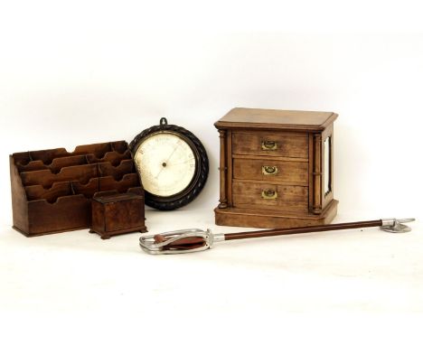 A walnut miniature chest of drawers with mirrored sides, together with a cigarette box, a shooting stick, an aneroid baromete