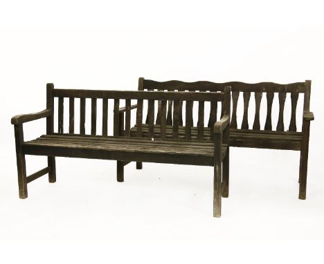 A slatted teak garden bench,  152 cm x 54 cm x 84 cm, and one other similar, 159 cm x 83 cm x 88 cm 