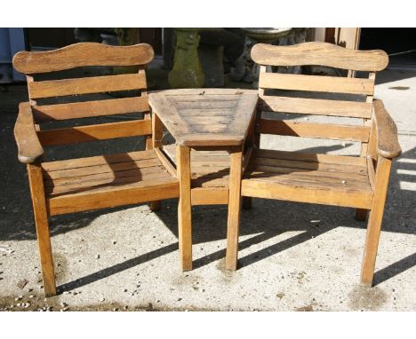 Reconstituted stone garden pots, a cast iron stepped planter and a teak garden bench