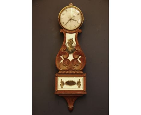 A modern wooden wall clock, with silvered dial and gilt figure decoration, 94cm high
