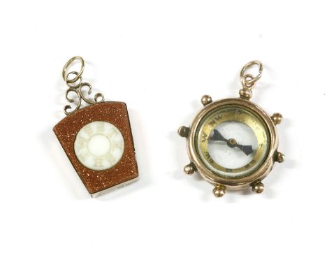 An Edwardian 9ct gold synthetic goldstone fob, with white hardstone circular centre engraved with symbols, and an Edwardian g