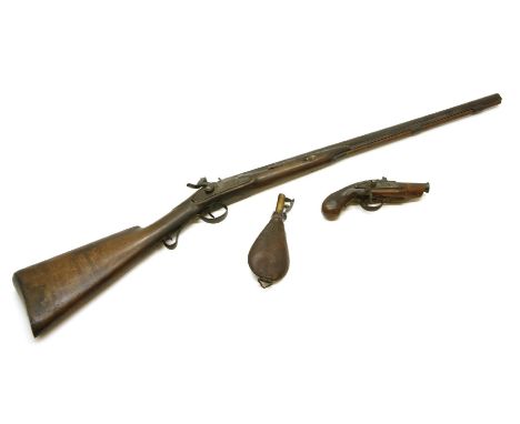 An antique hammer gun, octagonal to round barrel, together with a powder flask stamped G&I Hawksley, the gun 112cm long