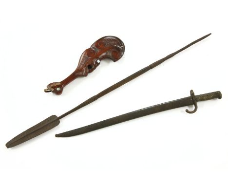 A First World War French bayonet, together with a spear and a Maori souvenir club