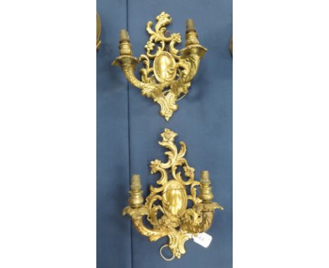 A pair of gilt metal rococo style two branch electric Wall Light Fittings of acanthus design, 1ft L