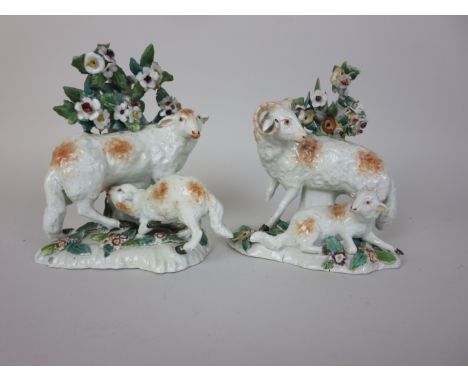 A pair of Derby Figures of Ewes and Lambs with bocage background and painted details, 6in, three patch marks, A/F
