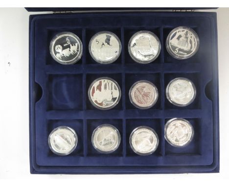A Westminster Case containing a collection of Australian silver $5 & $10, to include examples from the "Snowy Mountains Schem