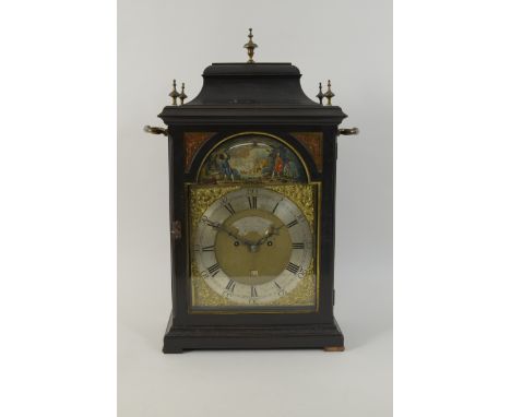 An 18th Century Bracket Clock with arched dial, brass corner spandrels, silvered chapter ring, date aperture, inscribed Samue