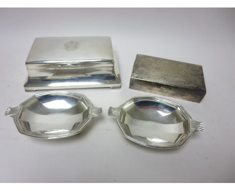 A George V Cigarette Box engraved coat of arms, Birmingham 1934, another with engine turning, Birmingham 1933, and a pair of 