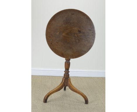 An early 19th Century mixed wood Tripod Table with circular top and turned column