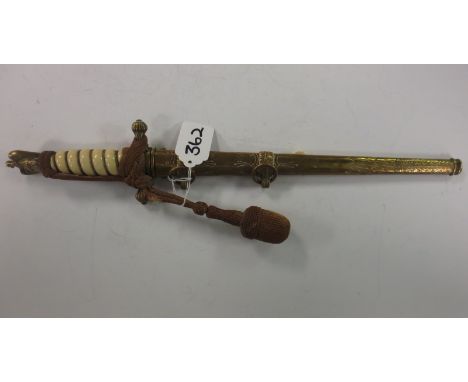 A German Kriegsmarine Dress Dagger, Lufteagle brass hilt with an engraved brass scabbard (scabbard clip A/F) AMENDMENT - Not 