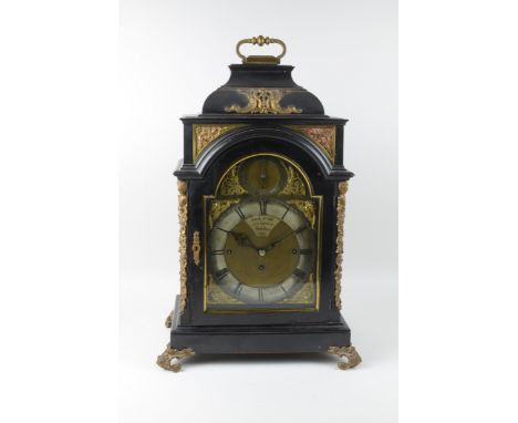 A 19th Century Bracket Clock by J & A Jump, 1 Old Bond St. London, 129, having arched brass dial having subsidiary strike/sil