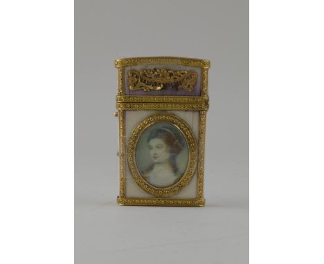 A late 18th Century gold mounted ivory Souvenir Sewing Case with oval portrait and lock of hair reserves, containing folding 