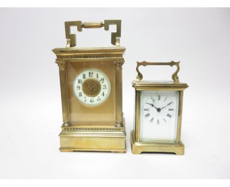 A large late 19th Century brass cased Carriage Clock with gilt dial, cream chapter ring, lever escapement with striking movem