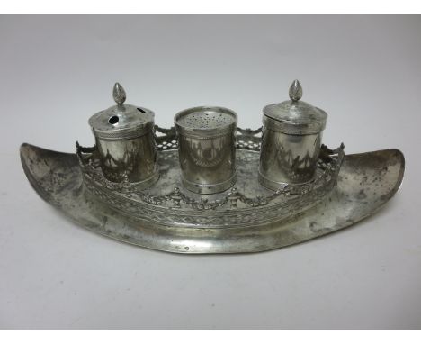 A Continental silver oval Inkstand fitted pen holder and another pot with pineapple finials flanking cylindrical sander with 