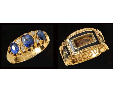 A Sapphire and Diamond Ring pav-set three graduated oval-cut sapphires with pairs of rose-cut diamonds between in 18ct gold, 