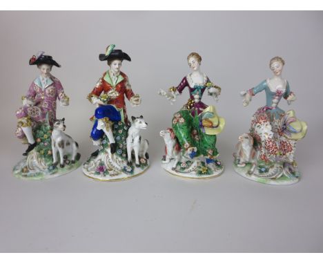 Two pairs of 19th Century Continental porcelain Figures with sheep, dogs and bonnets, floral encrusted and brightly painted o