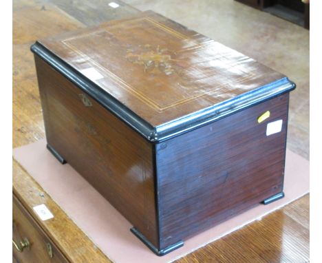A 19th Century Music Box with inlaid cover, having bells, drum visible, playing eight airs, 6in cylinder, 17 1/2in overall