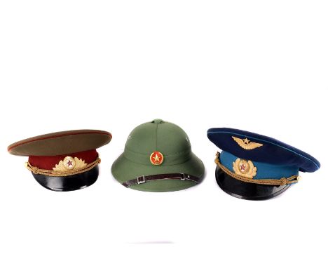 A Soviet Era Russian Air Force parade Officers aviation visor cap, together with a similar army example, together with a Nort