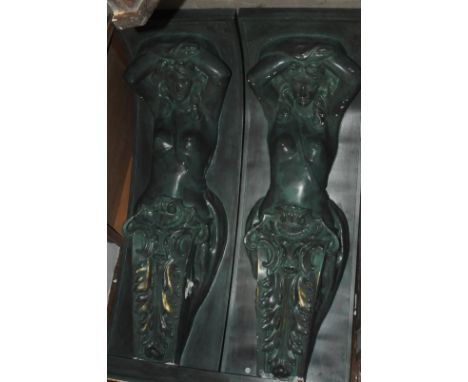 A vintage ornate fireplace surround, having green painted plaster figural term supports and other componant parts, some damag