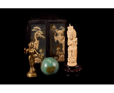 A small collection of Asian Works of Art,  including a carved jade lotus bowl, a brass Indian god, a carved bone figure and o