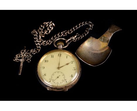 A silver open faced pocket watch, having Arabic numerals to face, with engraved design back, on a silver guard chain, togethe