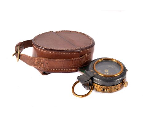 A military J.H Stewart Ltd, compass, the mixed metal compass marked to back with broad arrow, in brown leather carry case (2)