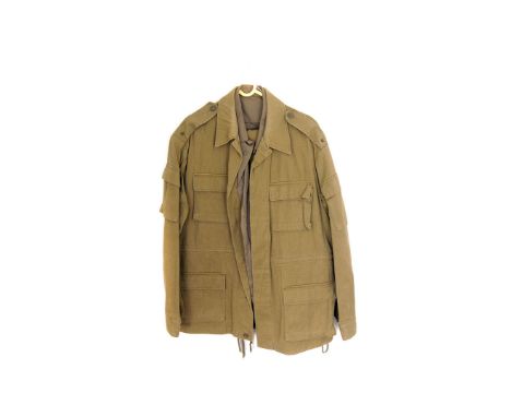 Three Mid 20th century Russian green army uniforms, comprising jackets, shirts, trousers etc (parcel) 