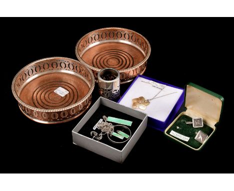 A pair of silver plated bottle coasters, having pierced and engraved decoration, together with a small group of silver and pl
