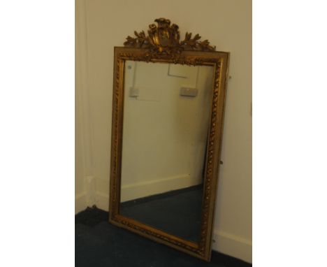 A large gilt wall mirror, the Harebell cartouche style ornate surround with leaf and berry themes, 158cm high 