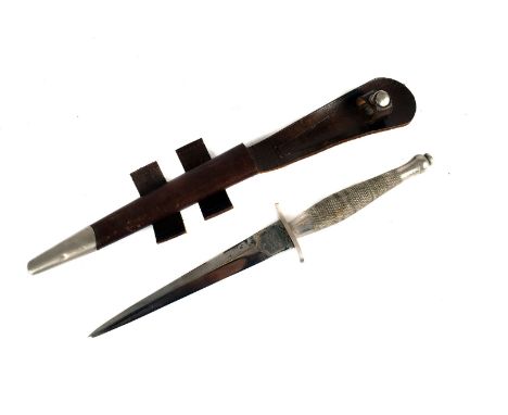 A Wilkinson Sword Fairbairn- Sykes 1st pattern Commando Fighting dagger, marked to both sides of the blade, with criss cross 