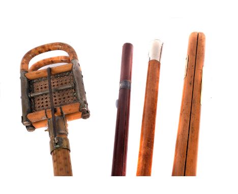 A Military sword swagger stick, together with a signals Malacca cane, pace stick and bamboo shooting stick (4) 