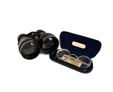 A pair of cased WWI field glasses, marked with a broad arrow, 9787, V.F2506, together with a pair of WWII gas mask spectacles