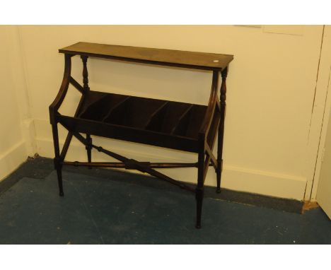 A vintage book trough stand, in dark wood, with shelf and compartmental shelf 