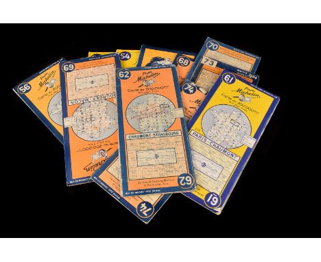 A collection of vintage maps and tourist booklets, including various Ordnance Survey maps of towns and counties in Britain, a