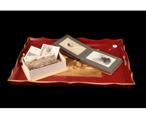 A collection of early 20th century postcards and photographs, including an album with army boxing match images and more, a bo