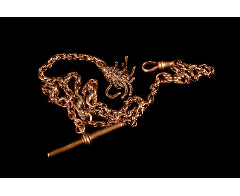 A Victorian 15ct gold watch chain, having a T-bar to one end with decorative tassel, approx 19g 