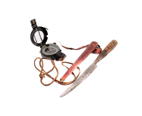 A WWII R.S.Alderidge Mk.IX Royal Marines military compass, marked with a broad arrow and dated 1939, together with a tribal s