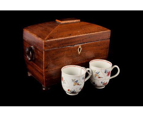 A Mahogany tea caddy, with box wood stringing and bone cover handles and sarcophagus shape, together with two New hall coffee