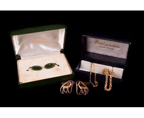 A pair of 9ct gold cufflinks, having pierced stag design to top, together with a 9ct gold and hardstone example, plus a  9ct 