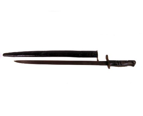 A WWI Remington bayonet, having a mis-stamped mark, 1918, also marked to other side of blade, US and other marks, in metal sc