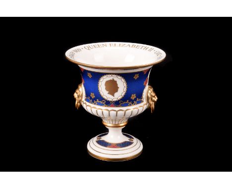 A Lladro porcelain figure of a seated Budda, the box model in fitted case, no. SZ44D, and a Royal Worcester footed bowl Queen