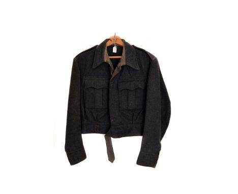 A WWII RAF Suits Aircrew Blouse, by CWS Ltd, marked and dated with a broads arrow and 1943, with two pockets to the from and 