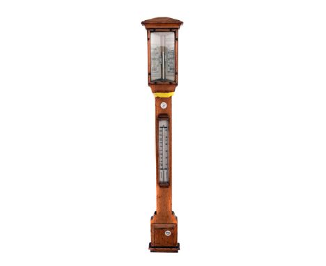 An Edwardian oak cased barometer, with mercury tubes 