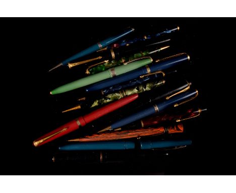 A collection of fifteen Conway Stewart fountain pens and pencils, including a black 150, a black 57, a black 479, a red and a